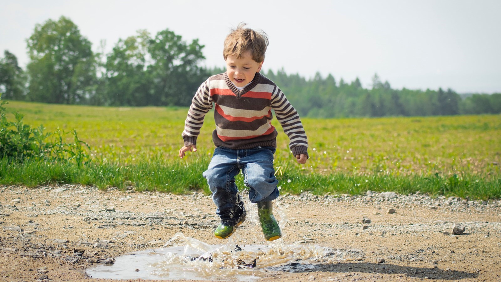 Boy%20jumping%20in%20puddle-2.jpg